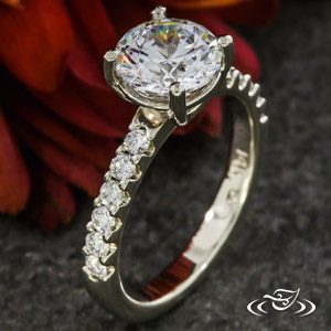 Classic 4 Prong Solitaire With Diamond Fishtail Accents