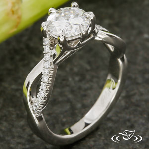 Platinum Twist Ring With Moissanite Center