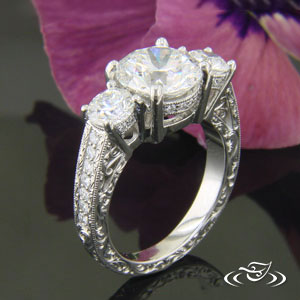 Platinum Engagement Ring With Hand Done Filigree And Hand Engraved Details, With Micro Bead Set Diamond Accents.